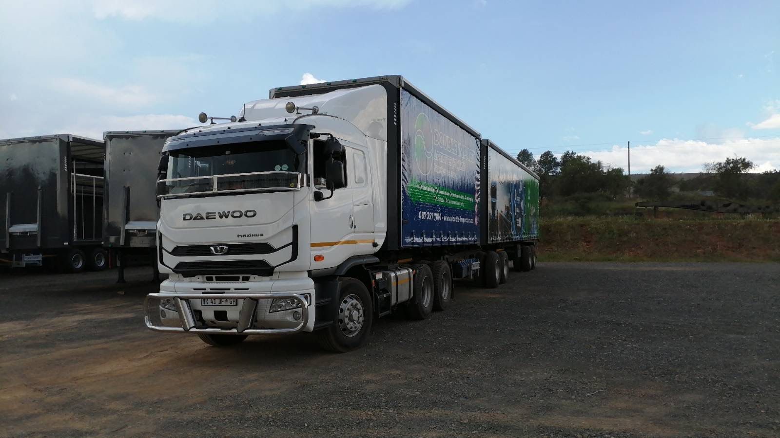 Double Impact Projects fleet on the road