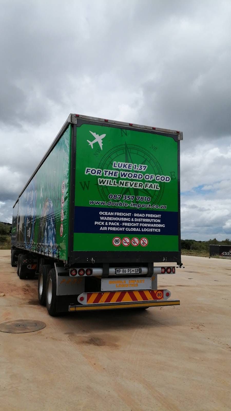 Double Impact Projects truck on the move